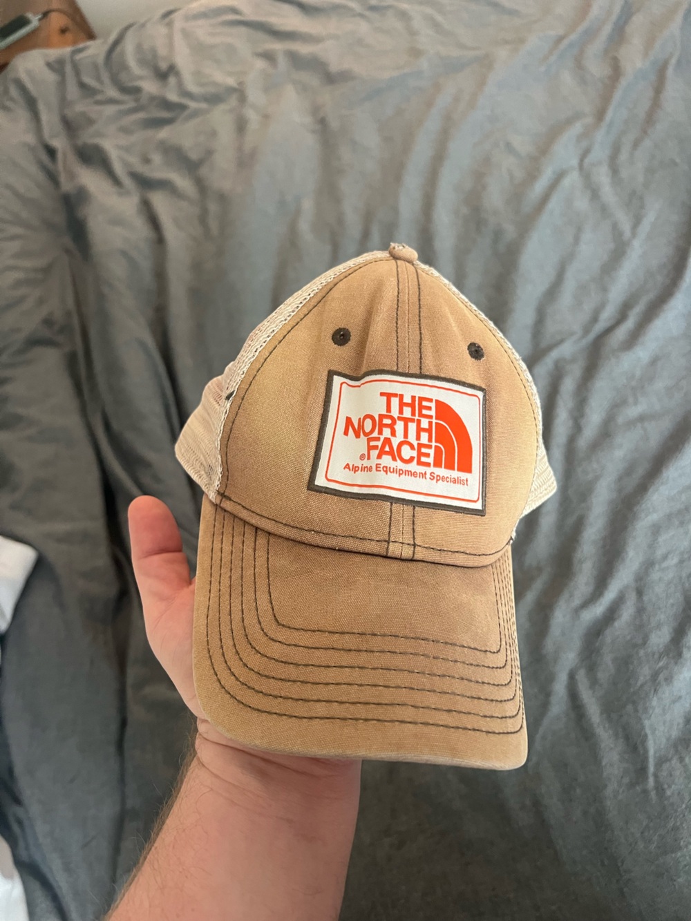 The North Face Tan Trucker Hat with Orange Logo Patch
